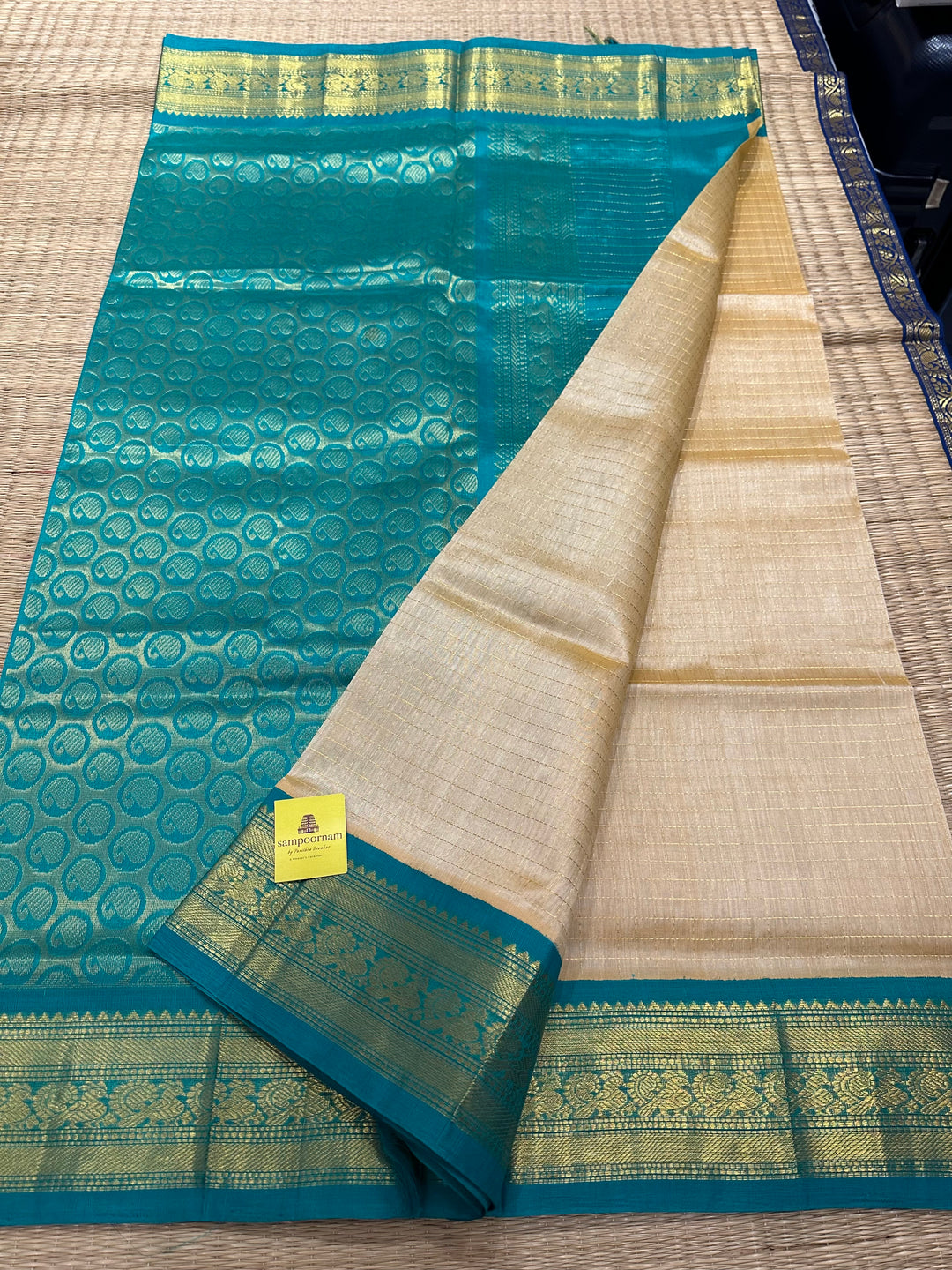 Offwhite with Sea Green , Body Zari Kattam , Rich Kanchi Border and Grand Pallu Korvai Silk Cotton Saree