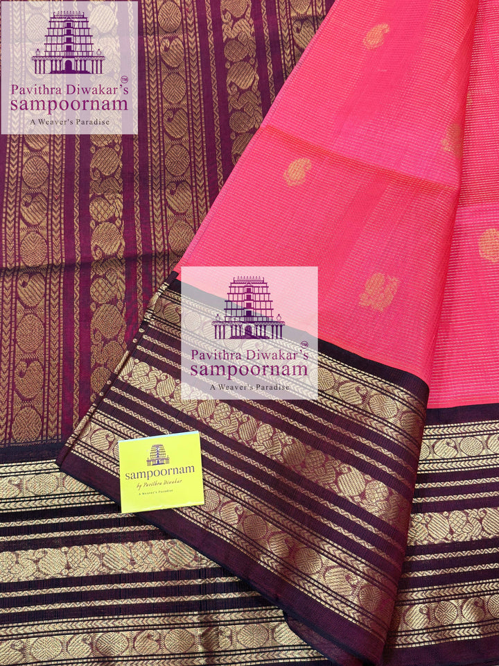 Lotus Pink with Dark Araku , Podi Kattam with butta in the body , Kanchi borders and rich Pallu Korvai Silk Cotton Saree