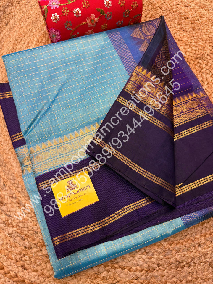 Light Blue with Dark Blue , Rich Zari Checks in the body and Rettapet Border , Grand Pallu Pure Korvai Silk Cotton Saree