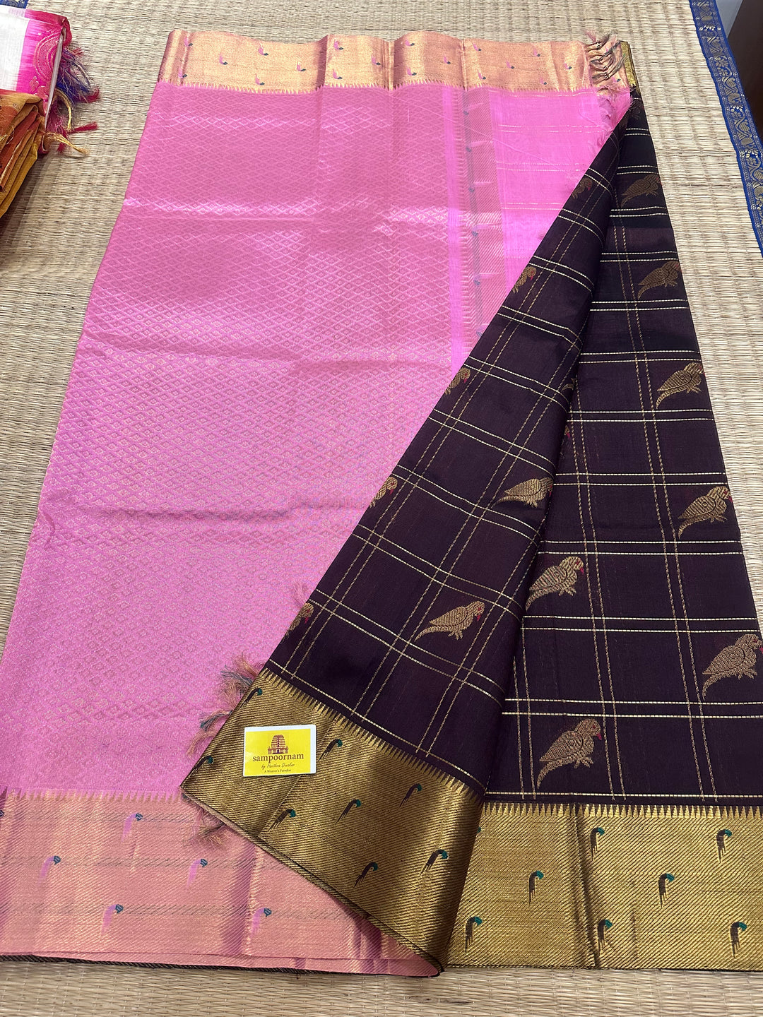 Coffee Brown with Baby Pink colour , Paithani Borders , Zari Checks with Parrot motifs in the body , and Pure Silk Cotton Saree