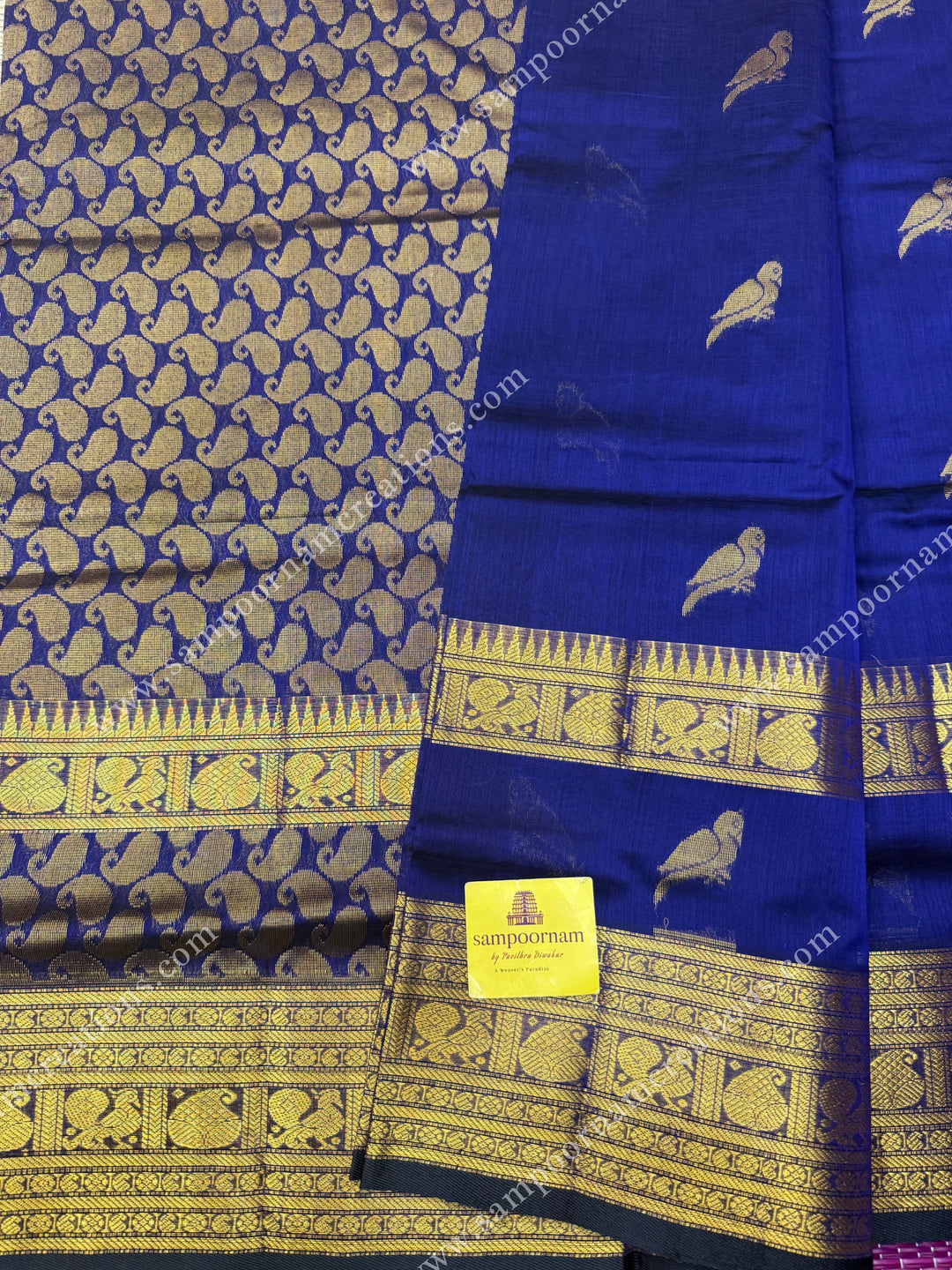 Indigo Blue  , Zari Parrot motif in the body and  One side big rettapet border , grand Pallu Silk Cotton Saree