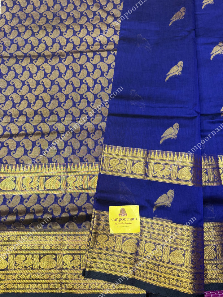 Indigo Blue  , Zari Parrot motif in the body and  One side big rettapet border , grand Pallu Silk Cotton Saree