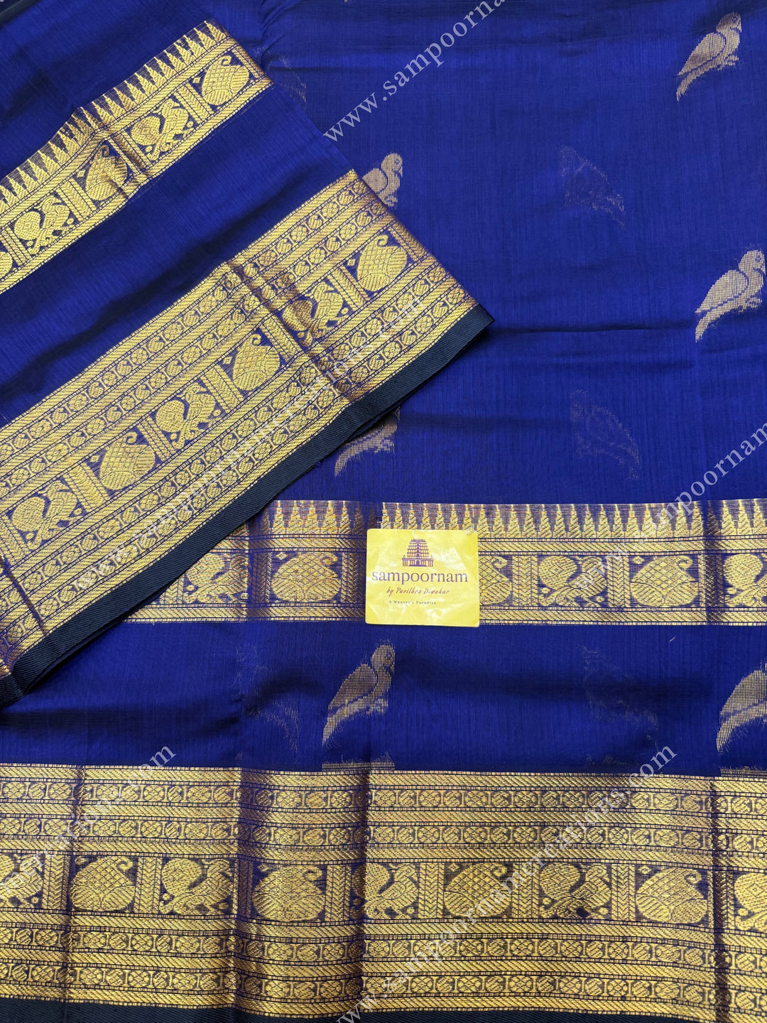 Indigo Blue  , Zari Parrot motif in the body and  One side big rettapet border , grand Pallu Silk Cotton Saree