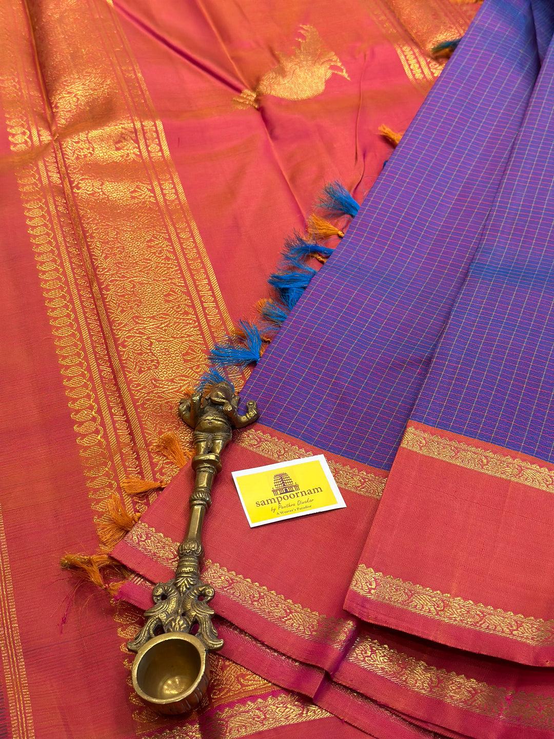 A Traditional Lavender with Pinkish Orange Body Checks Rettapet Kanjivaram Silk Saree with Kalakshetra Kili Pallu