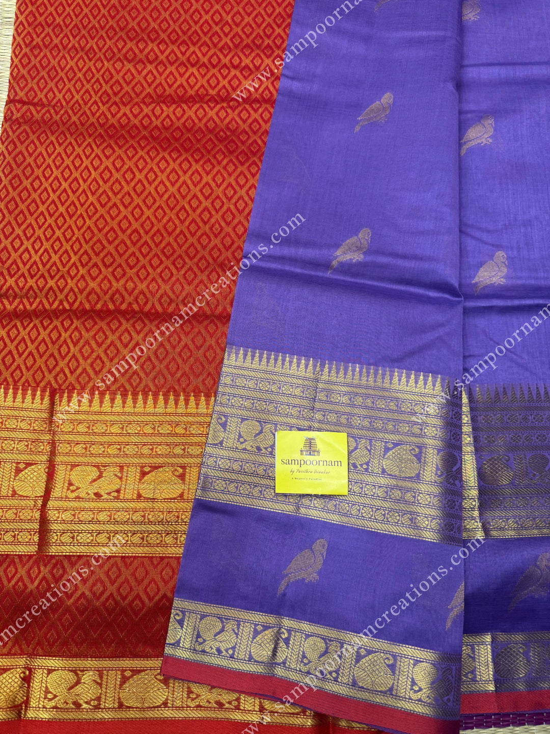Lilac with Red  , Zari Parrot motif in the body and  One side big rettapet border , grand Pallu Silk Cotton Saree