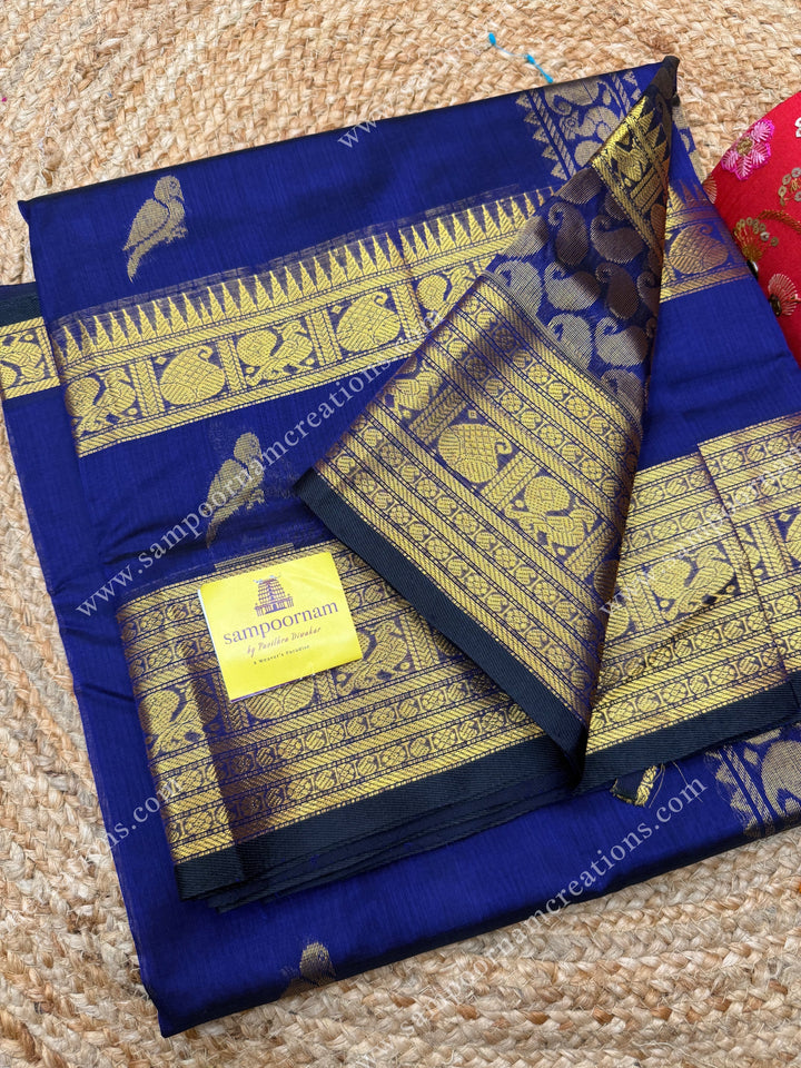 Indigo Blue  , Zari Parrot motif in the body and  One side big rettapet border , grand Pallu Silk Cotton Saree