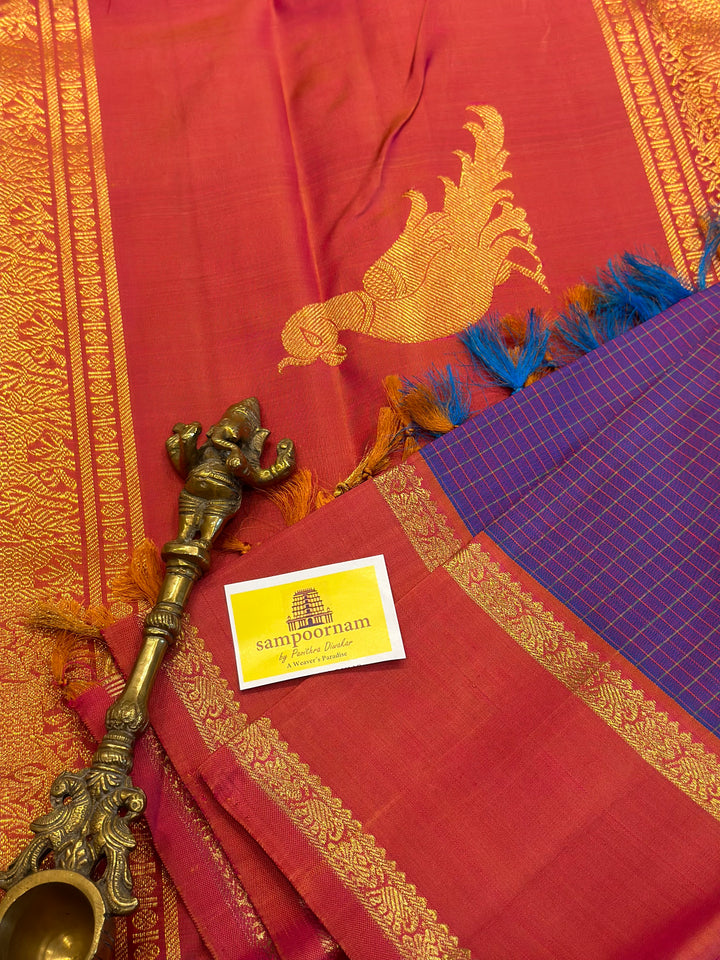 A Traditional Lavender with Pinkish Orange Body Checks Rettapet Kanjivaram Silk Saree with Kalakshetra Kili Pallu