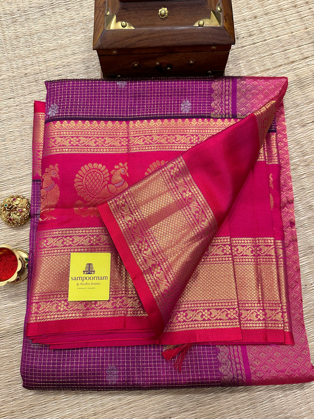 Purple with Pink , one side Big Peacock Motif Border and podi Kattam in the body with Zari Butta and Grand Pallu Korvai Silk Cotton Saree