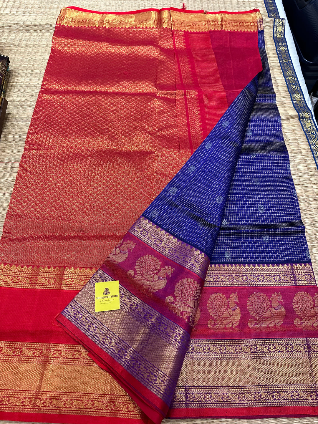 Blue with Red , One Side Big Peacock Motif Border , podi Kattam with Zari Motif in the body and Rich Pallu Korvai Silk Cotton Saree