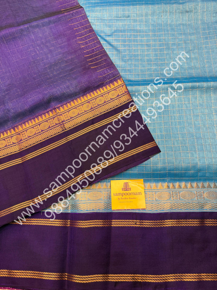 Light Blue with Dark Blue , Rich Zari Checks in the body and Rettapet Border , Grand Pallu Pure Korvai Silk Cotton Saree