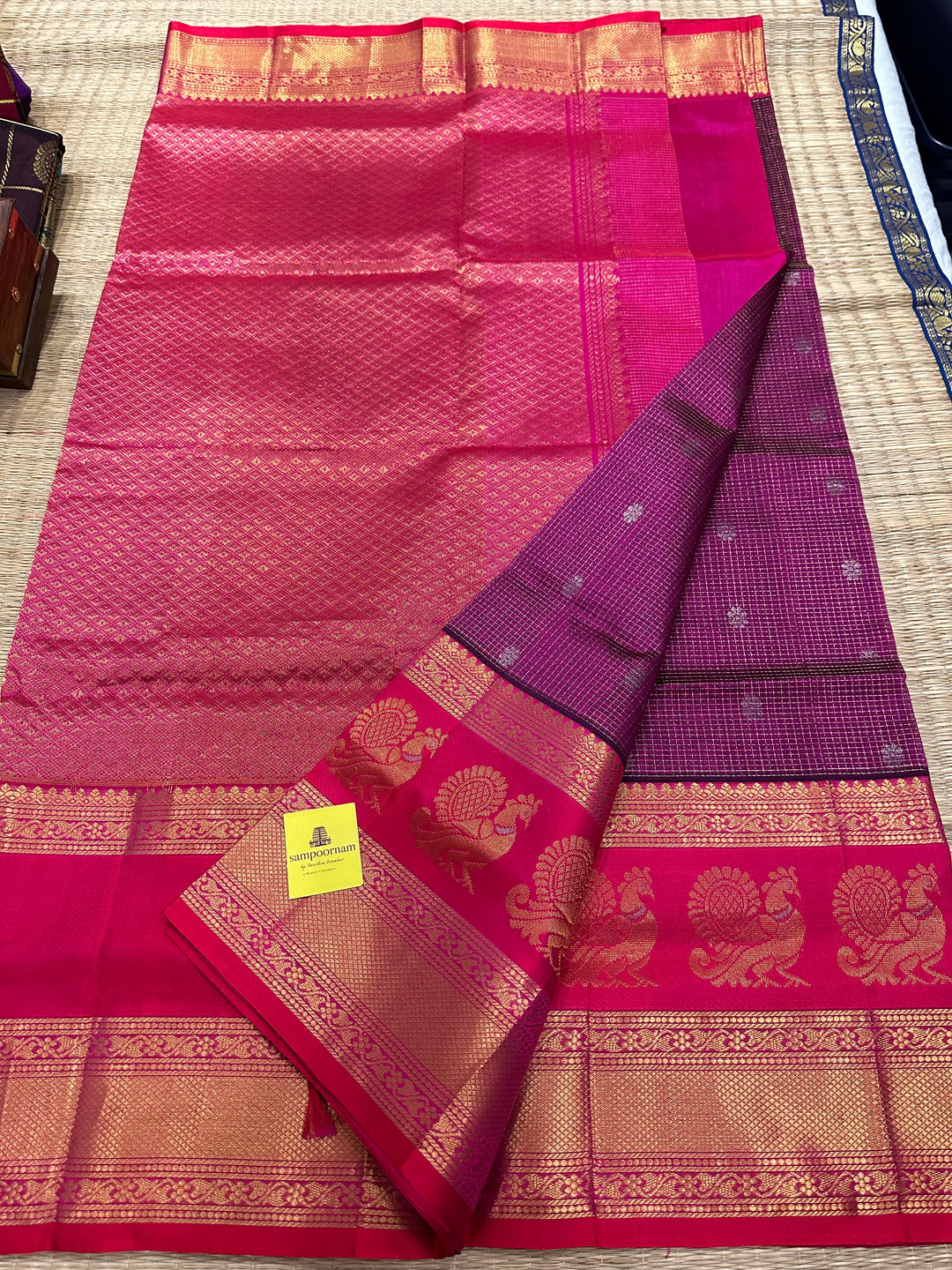 Purple with Pink , one side Big Peacock Motif Border and podi Kattam in the body with Zari Butta and Grand Pallu Korvai Silk Cotton Saree