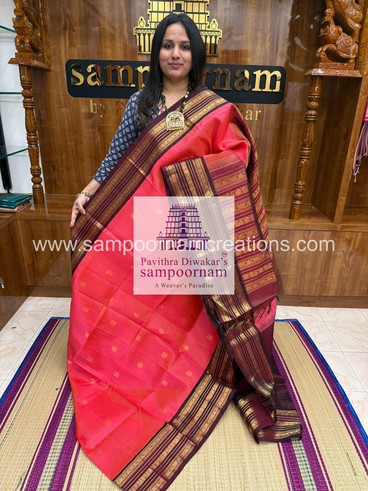 Lotus Pink with Dark Araku , Podi Kattam with butta in the body , Kanchi borders and rich Pallu Korvai Silk Cotton Saree