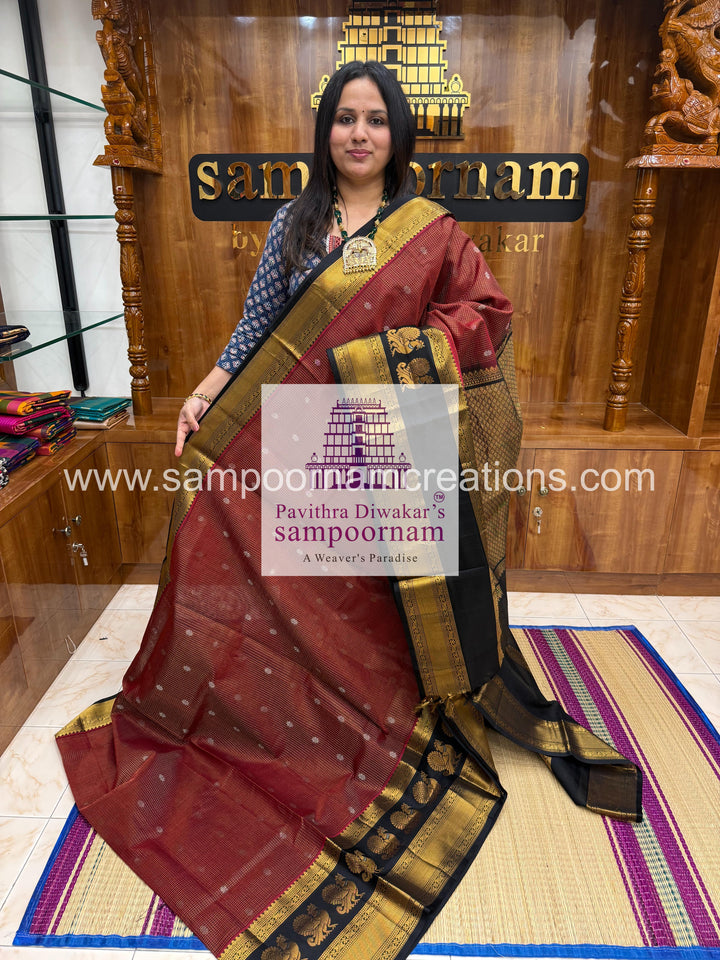Maroon with Black ,  Zari Podi Kattam in the body , one side big Satin border with Annam motif , traditional border and rich Pallu Korvai Silk Cotton Saree