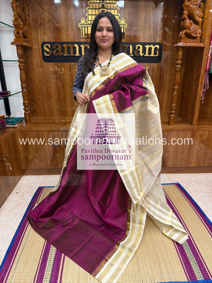 Dark Wine with White , Vairaoosi Zari line in the body ,rettapet border and grandPallu Korvai Silk Cotton Saree