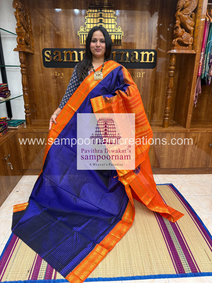 Blue with Orange , Zari Kattam in the body , rettapet border and rich  Pallu Korvai Silk Cotton Saree