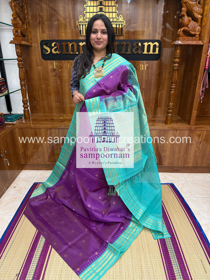 Purple with Turquoise Blue , rich zari Podi Kattam with butta in the body , temple traditional borders and rich  Pallu Korvai Silk Cotton Sare