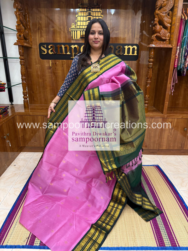 Pink with Green , Zari butta in the body , Kanchi traditional borders and rich  Pallu Korvai Silk Cotton Saree