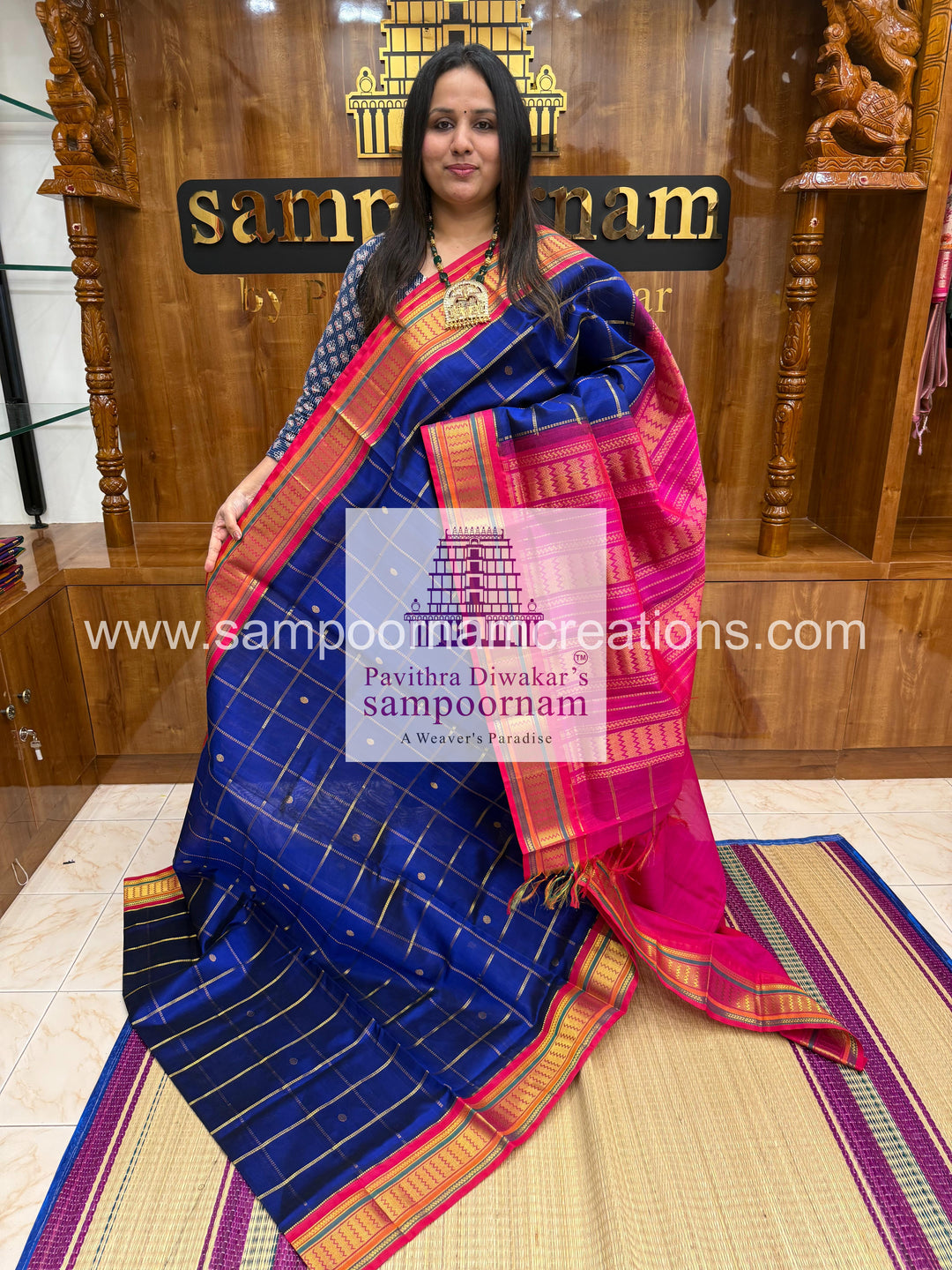 Blue with Pink , Zari checks in the body , rich Zari butta , traditional borders and rich Pallu Korvai Silk Cotton Saree