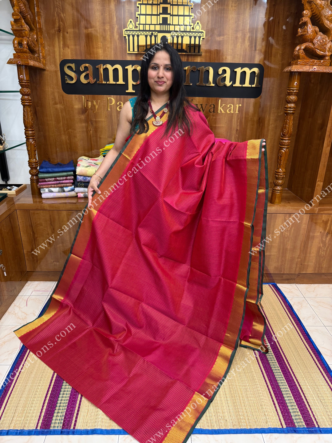 Red with Green Selvedge , Zari checks in the body , traditional  borders &  Pallu Silk Cotton Saree