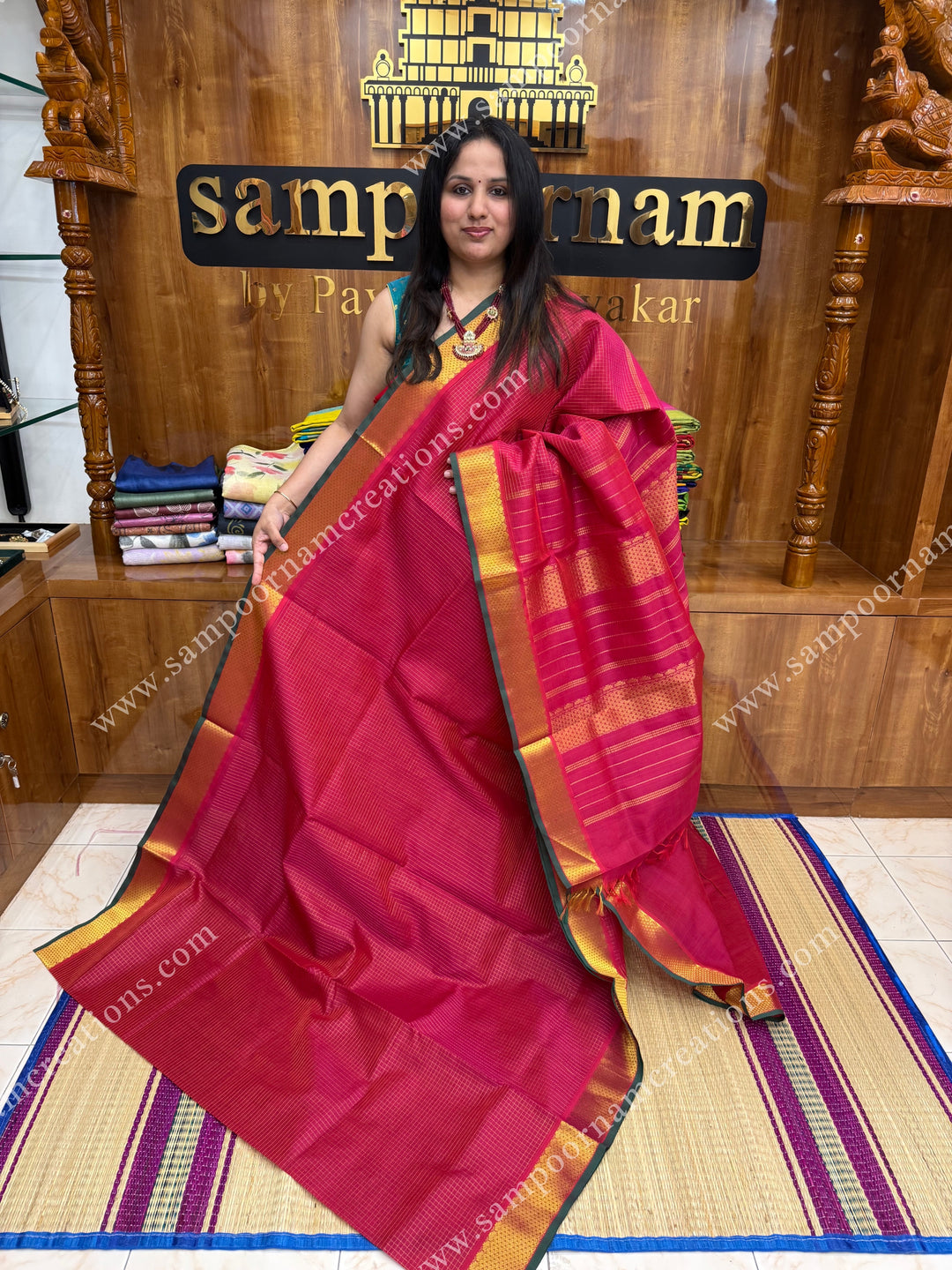 Red with Green Selvedge , Zari checks in the body , traditional  borders &  Pallu Silk Cotton Saree