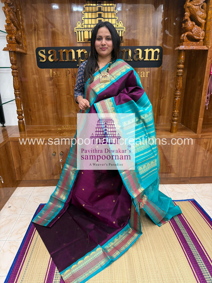 Purple with Blue ,rich Zari butta in the body, traditional borders and rich  , rich Zari butta in the body and Kanchi traditional borders and rich Pallu Korvai Silk Cotton Sare