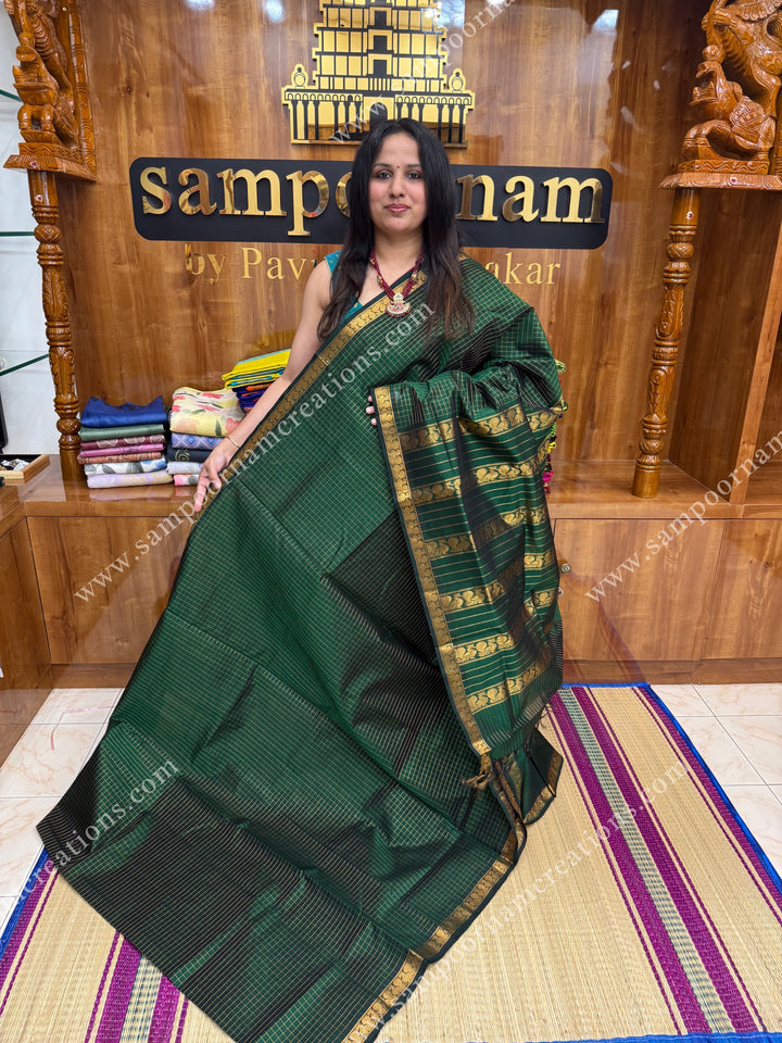 Bottle Green , Rich  Zari  checks in the body small Traditional borders , traditional Pallu Silk Cotton