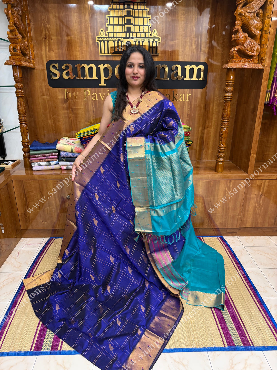 Blue with Turquoise Blue , rich Parrot Zari motif in the body and traditional Paithani Borders ,  grand Pallu Korvai Silk Cotton Saree