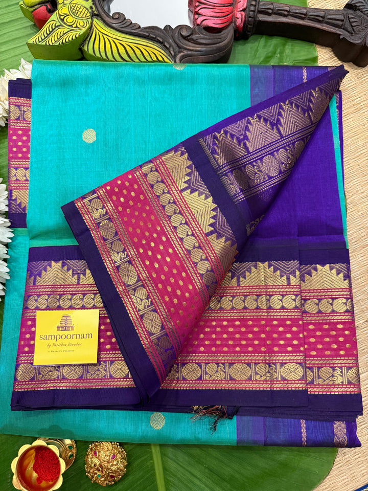 Ramar Blue with Blue , Lakshadeepam rich kanchi border , rich Zari butta in the body , traditional Pallu , Korvai Silk Cotton Saree