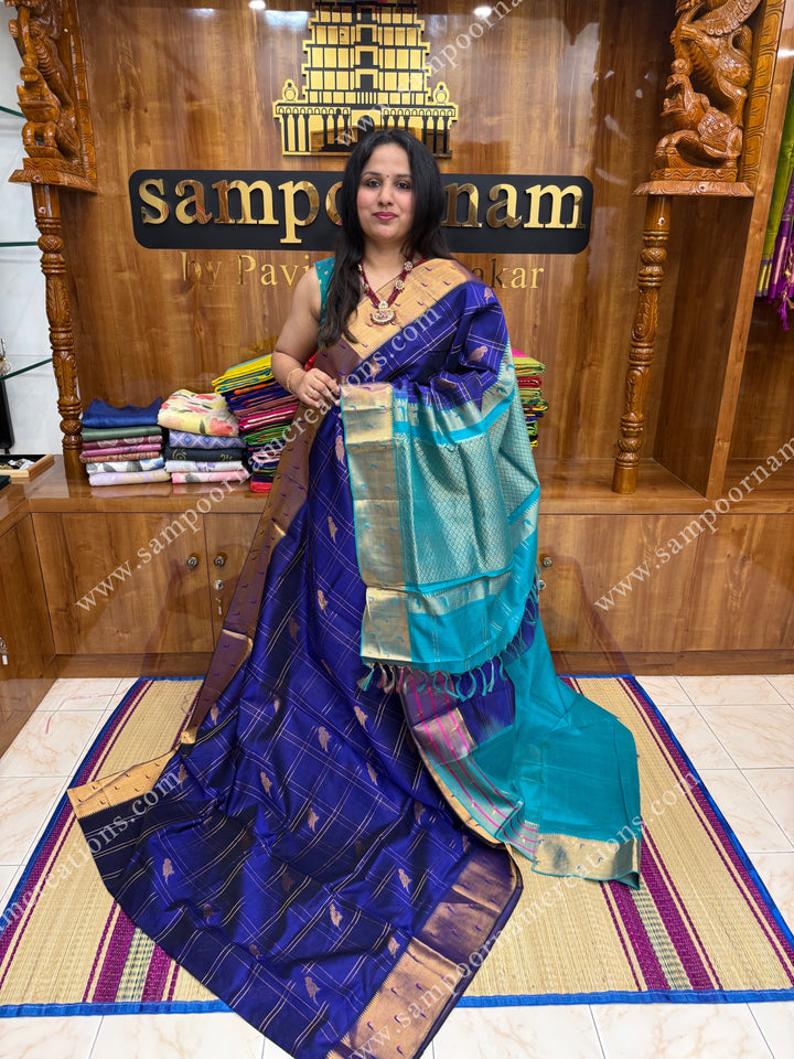 Blue with Turquoise Blue , rich Parrot Zari motif in the body and traditional Paithani Borders ,  grand Pallu Korvai Silk Cotton Saree