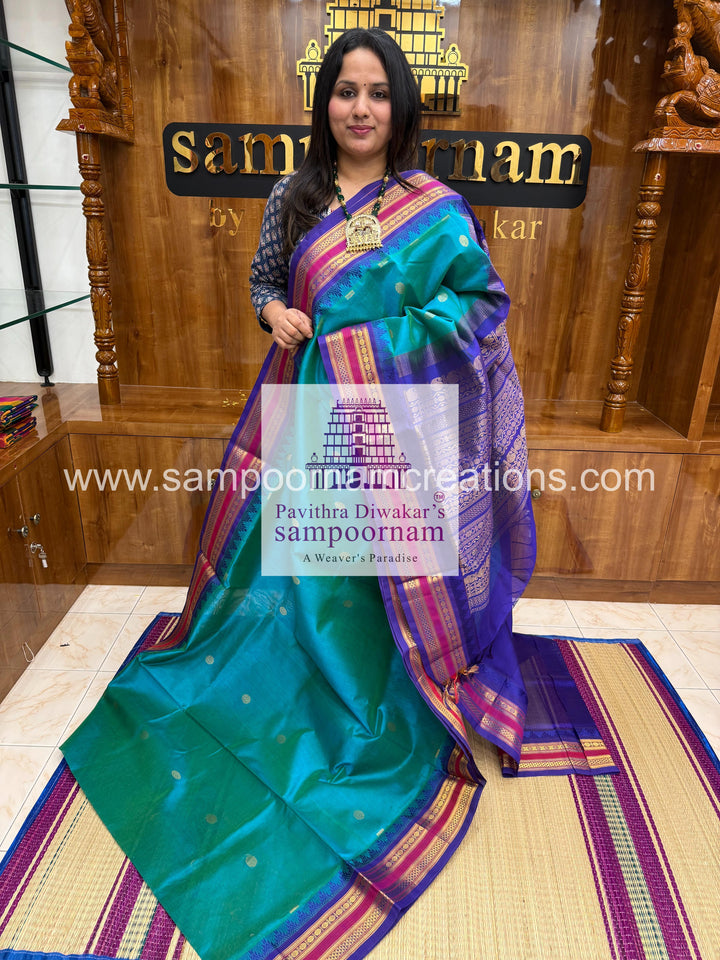 Ramar Blue with Dark  Blue ,rich Zari butta in the body, traditional borders and rich  , rich Zari butta in the body and Kanchi traditional borders and rich Pallu Korvai Silk Cotton Saree