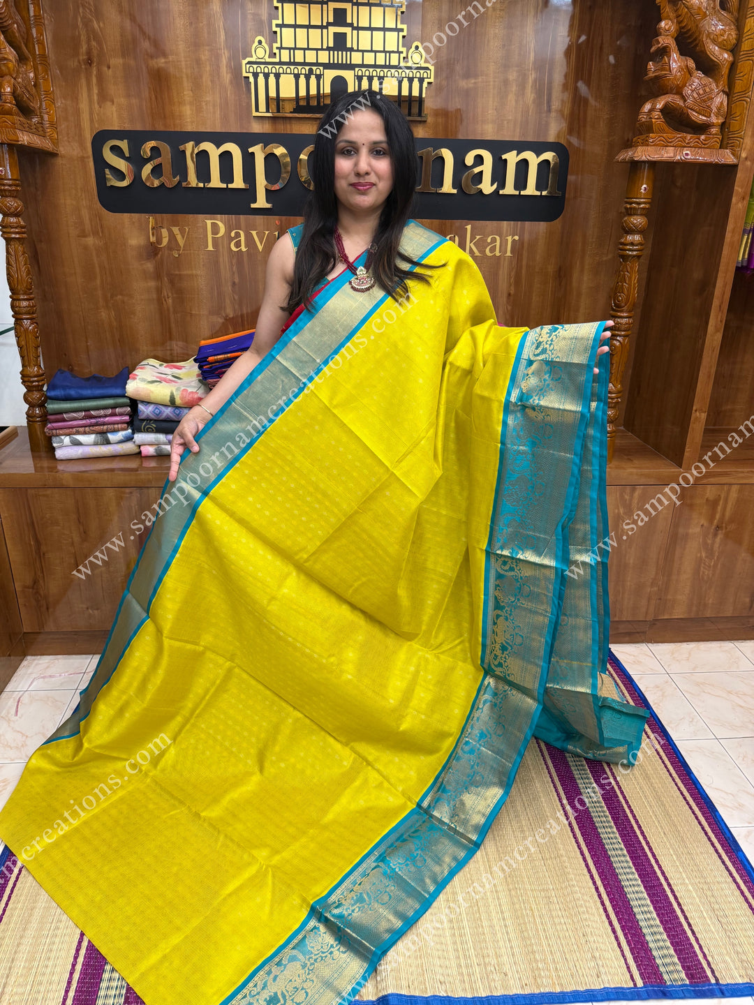 Lemon Yellow with Turquoise Blue ,  Rich Zari butta and Podi Kattam in the body , traditional One side long border , grand Pallu Korvai Silk Cotton Saree