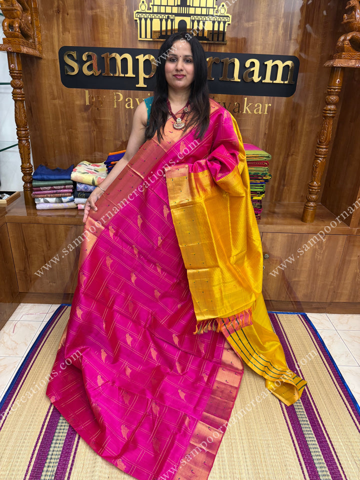 Pink with Mustard Yellow , rich Parrot Zari motif in the body and traditional Paithani Border ,  grand Pallu  Silk Cotton Saree