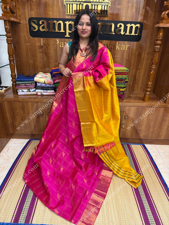 Pink with Mustard Yellow , rich Parrot Zari motif in the body and traditional Paithani Border ,  grand Pallu  Silk Cotton Saree