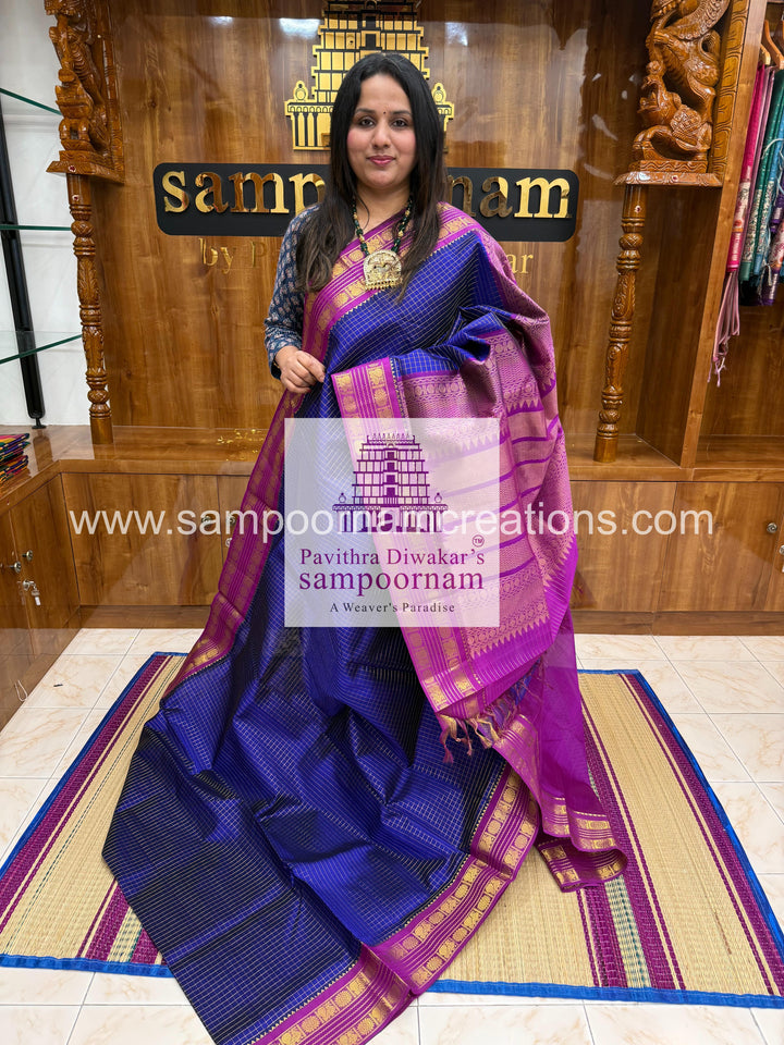 Blue with Purple , Zari checks in the body , traditional rettapet border and rich Pallu Korvai Silk Cotton Saree