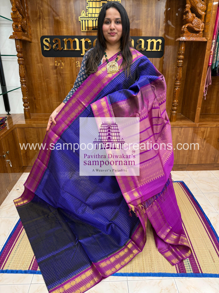 Blue with Purple , Zari checks in the body , traditional rettapet border and rich Pallu Korvai Silk Cotton Saree