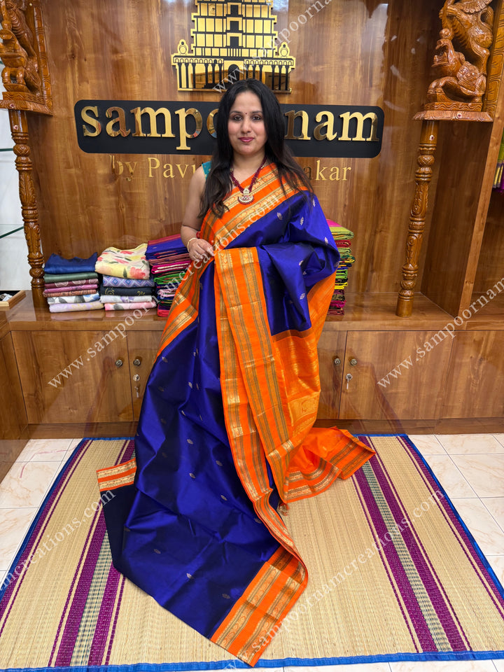MS Blue with Orange , Rich Zari butta and Rettapet borders ,  grand Pallu Korvai Silk Cotton Saree