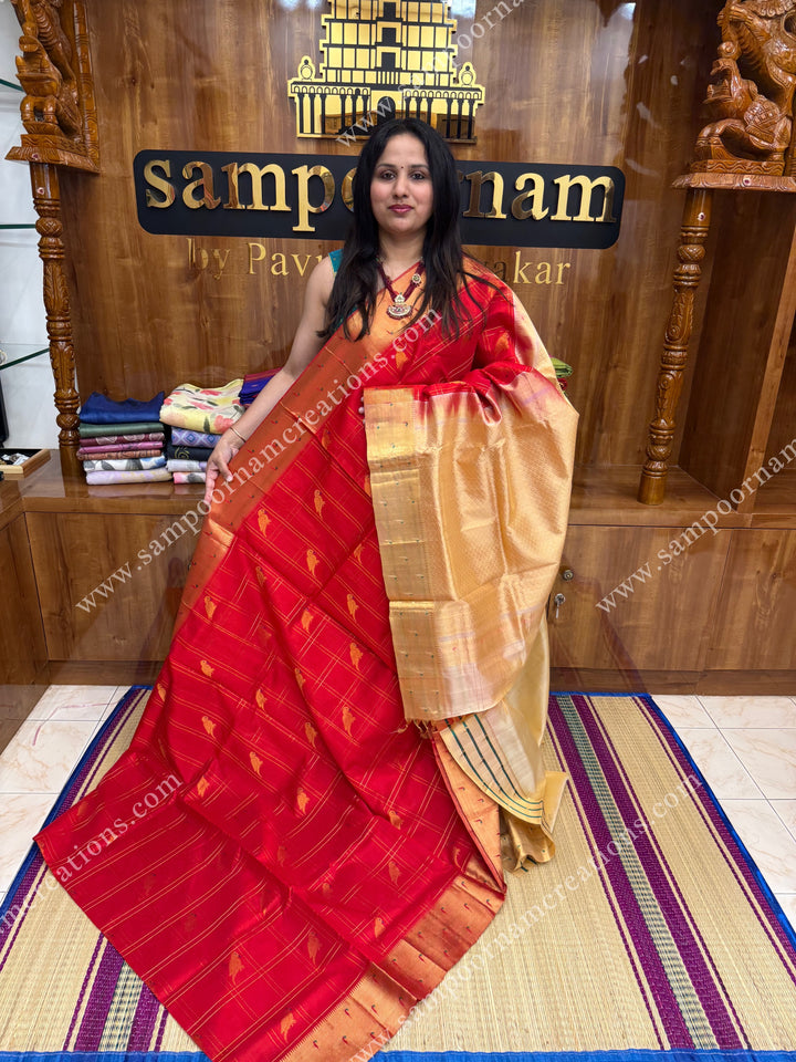 Red with Cream , rich Parrot Zari motif in the body and traditional Paithani Borders,  grand Pallu Silk Cotton Saree