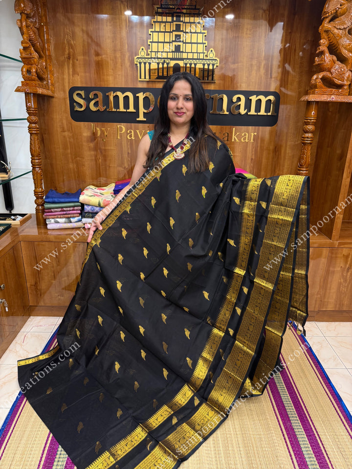 Black  , Zari Parrot motif in the body and  One side big rettapet border , grand Pallu Silk Cotton Saree