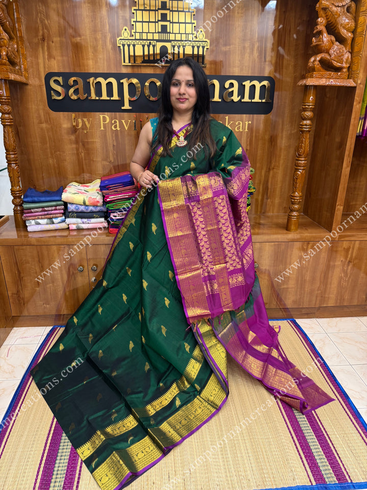 Bottle Green with Vadamalli Purple, Zari Parrot motif in the body and  One side big rettapet border , grand Pallu Silk Cotton Saree