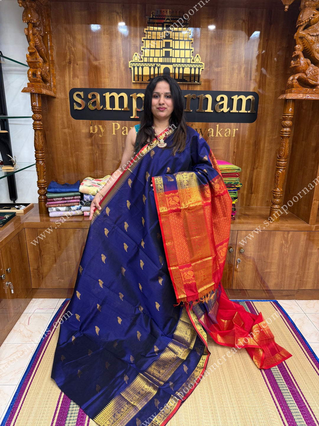 Blue with Red , Zari Parrot motif in the body and  One side big rettapet border , grand Pallu Silk Cotton Saree