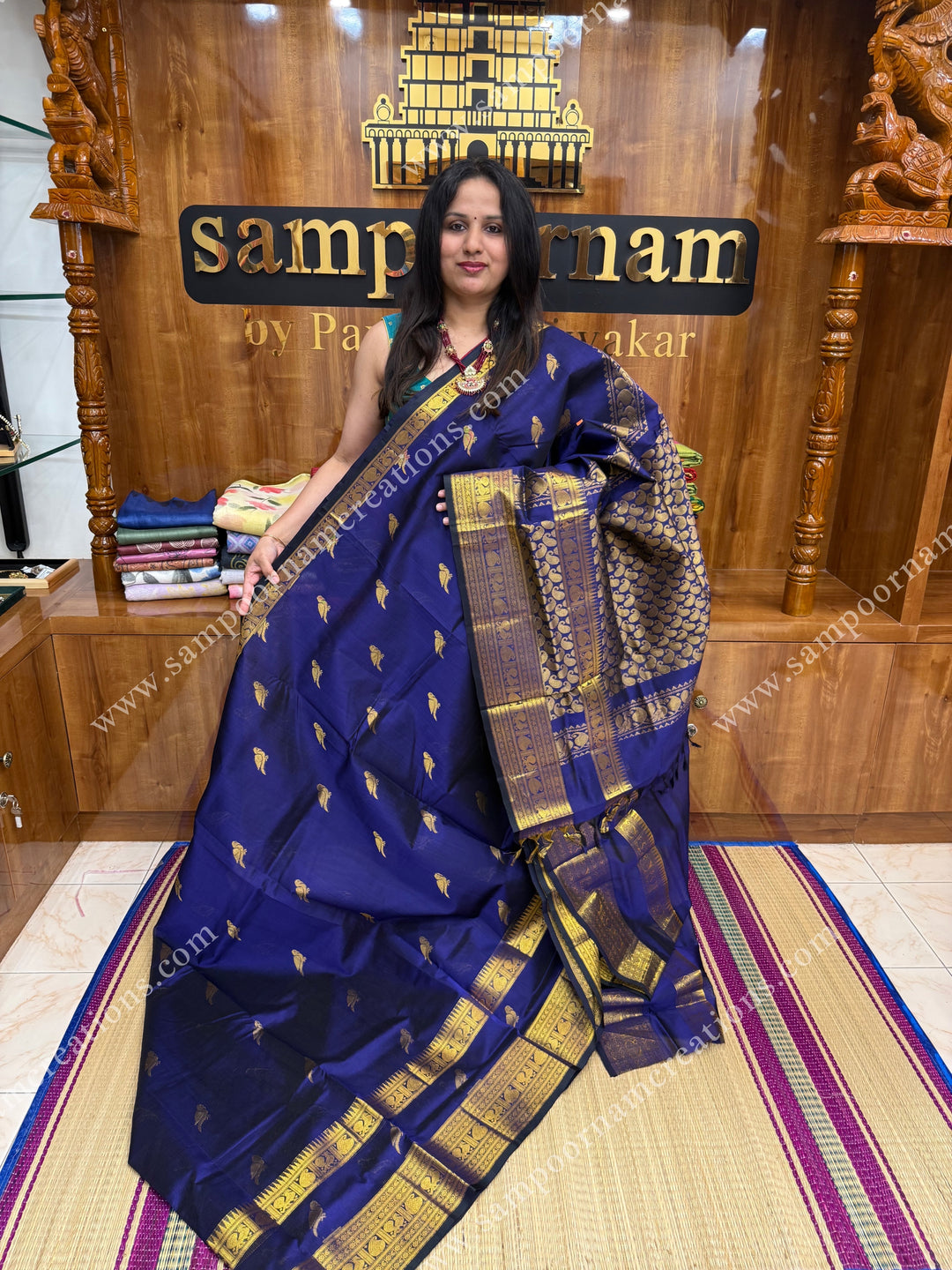 Indigo Blue  , Zari Parrot motif in the body and  One side big rettapet border , grand Pallu Silk Cotton Saree