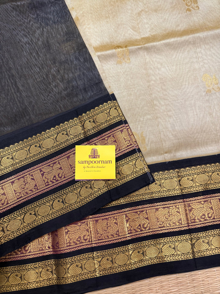 Gold with Black colour Rich Zari Butta in the body , Kanchi border and rich pallu Korvai Silk Cotton Saree
