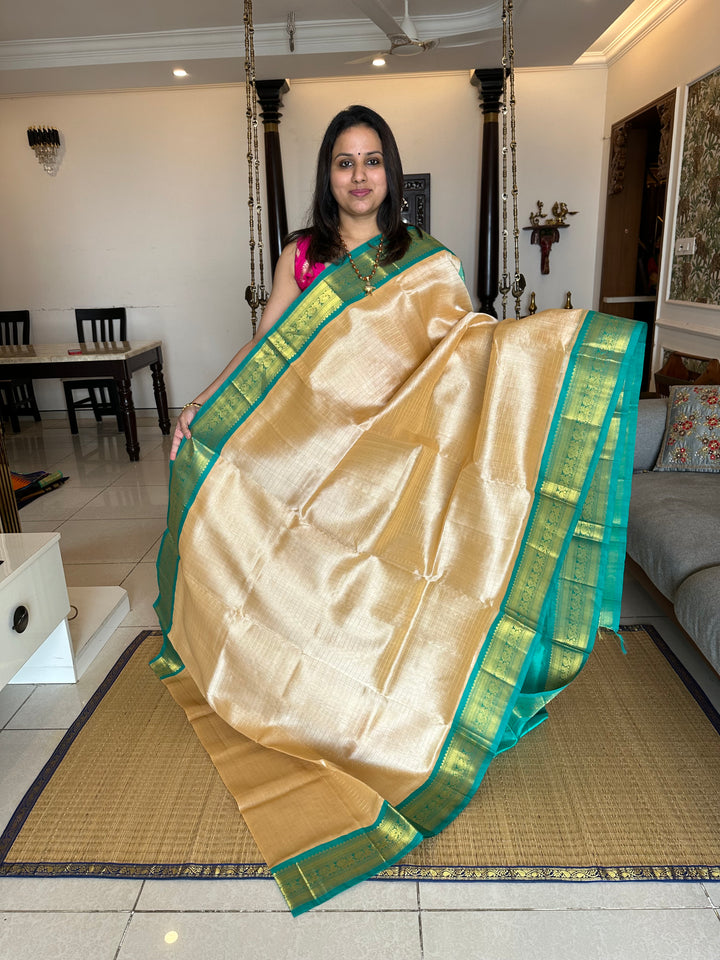 Offwhite with Sea Green , Body Zari Kattam , Rich Kanchi Border and Grand Pallu Korvai Silk Cotton Saree