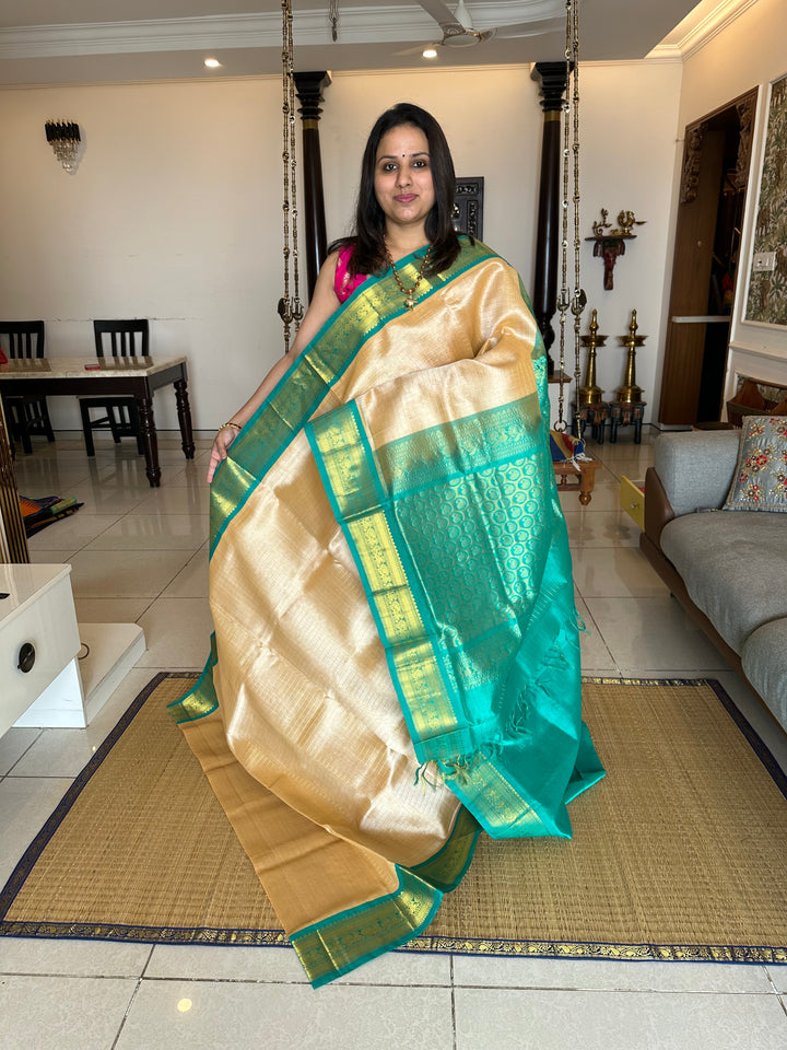 Offwhite with Sea Green , Body Zari Kattam , Rich Kanchi Border and Grand Pallu Korvai Silk Cotton Saree