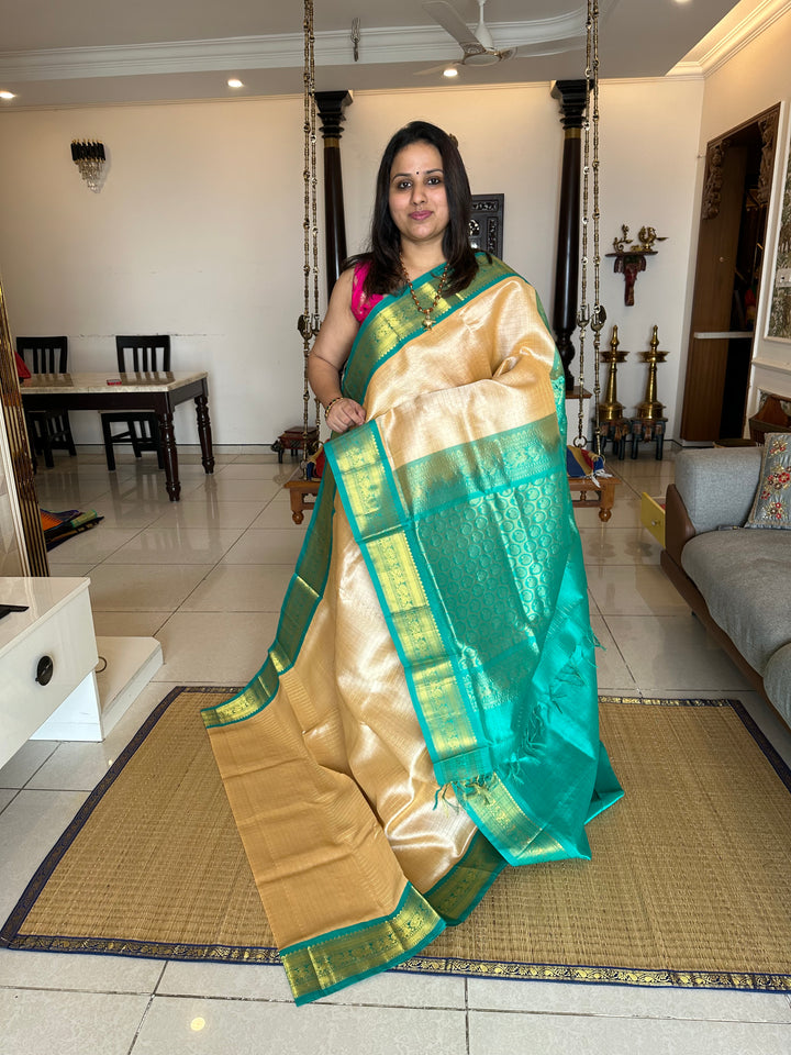 Offwhite with Sea Green , Body Zari Kattam , Rich Kanchi Border and Grand Pallu Korvai Silk Cotton Saree