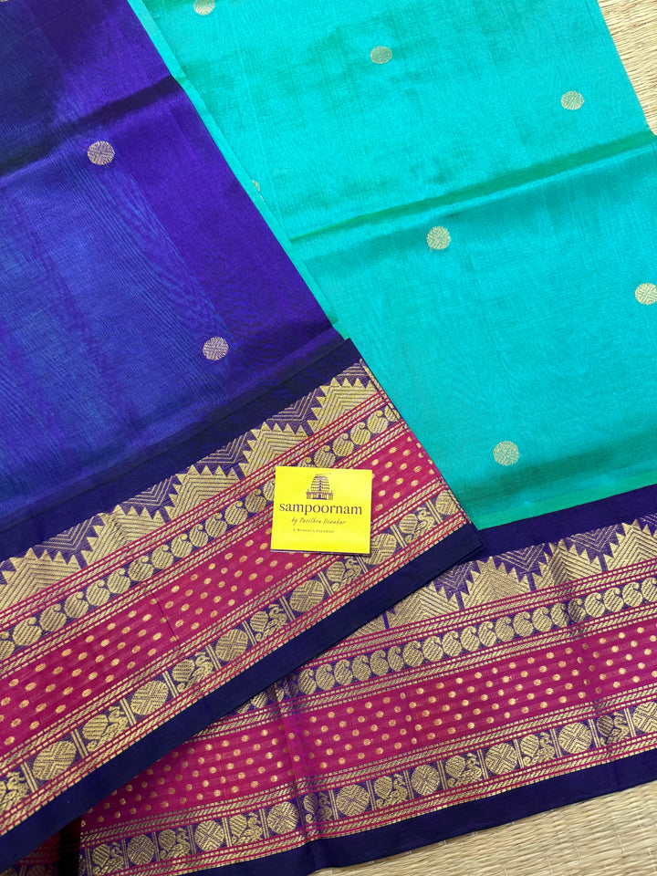 Ramar Blue with Blue , Lakshadeepam rich kanchi border , rich Zari butta in the body , traditional Pallu , Korvai Silk Cotton Saree