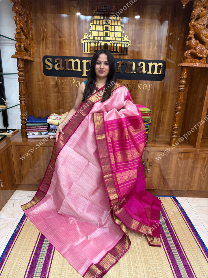 Baby Pink with Pink , Rich Zari checks in the body ,traditional borders ,  grand Pallu Korvai Silk Cotton Saree