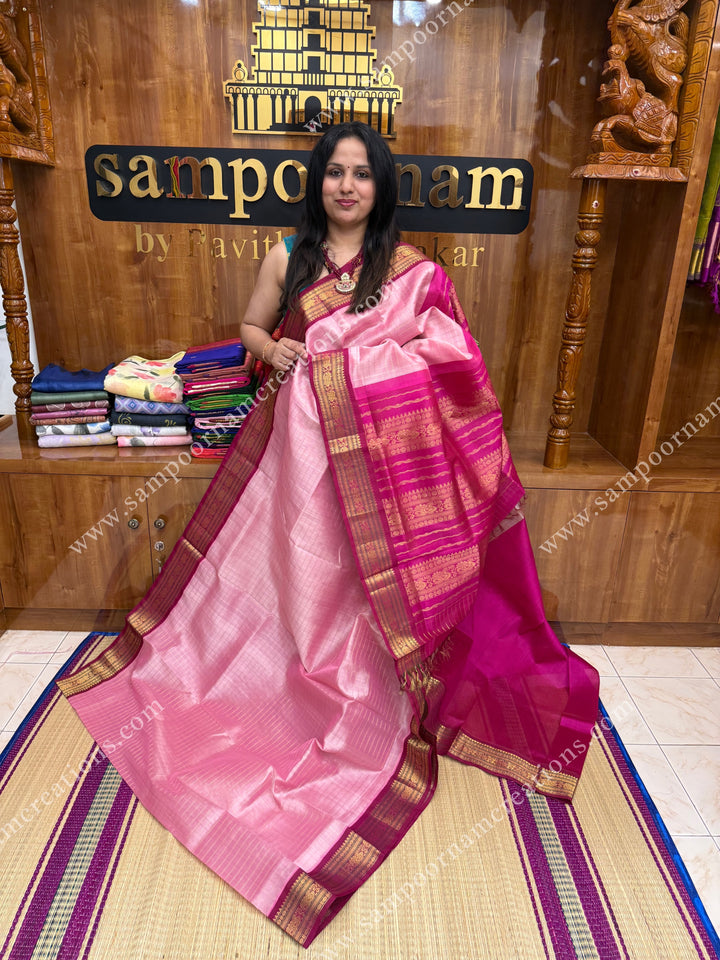 Baby Pink with Pink , Rich Zari checks in the body ,traditional borders ,  grand Pallu Korvai Silk Cotton Saree