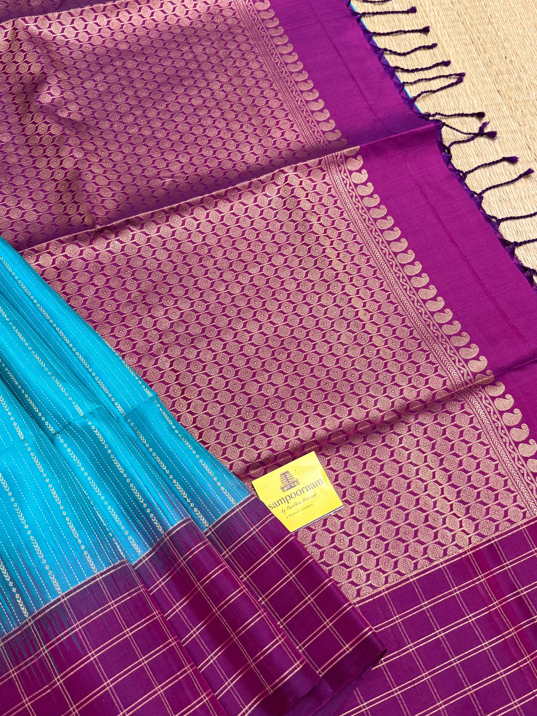 Rama Blue With Purple  colour , rich zari vertical line all over the body , traditional checks border and grand Pallu Pure Soft Silk Saree