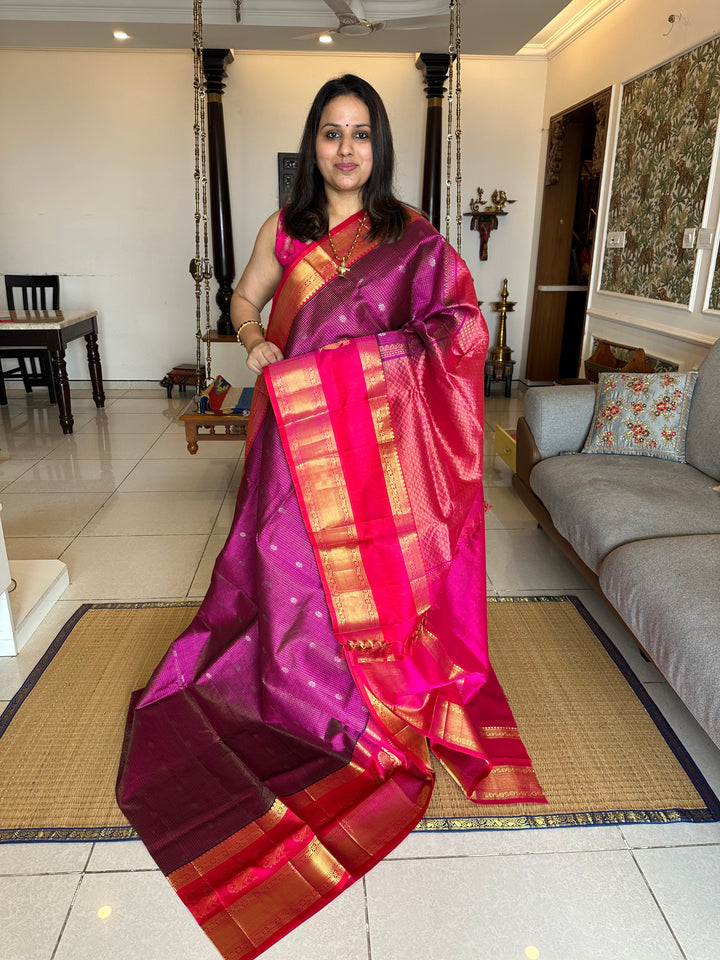 Purple with Pink , one side Big Peacock Motif Border and podi Kattam in the body with Zari Butta and Grand Pallu Korvai Silk Cotton Saree